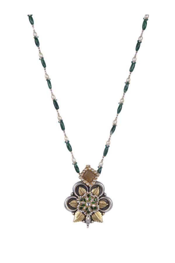 Necklace with a decorative pendant featuring green beads