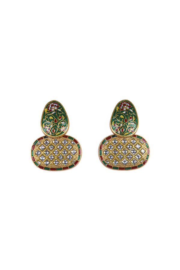 Pair of ornate earrings with intricate designs 