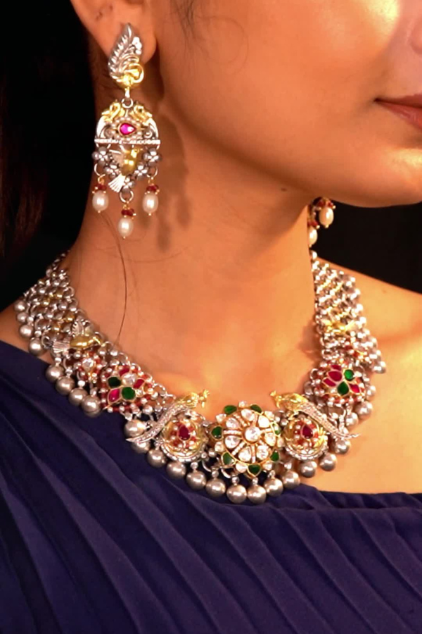 detailed necklace and earrings