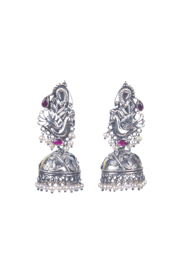 Pair of silver earrings with gemstones