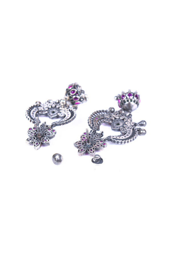 Pair of silver earrings with floral designs