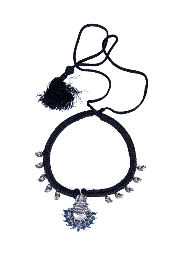 Black necklace with decorative pendant 