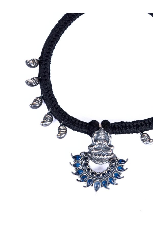 Black cord necklace with silver and blue pendant
