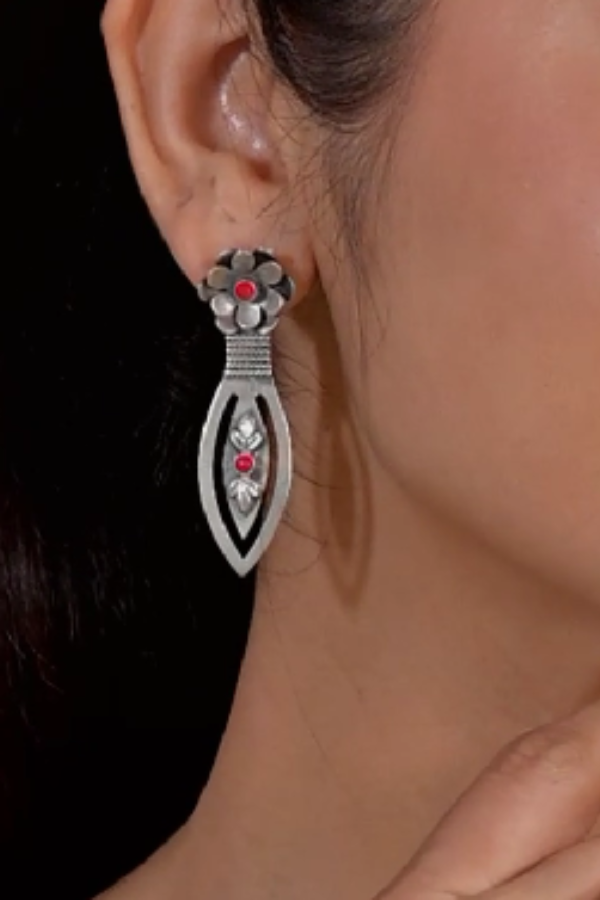 Silver earrings with red stones