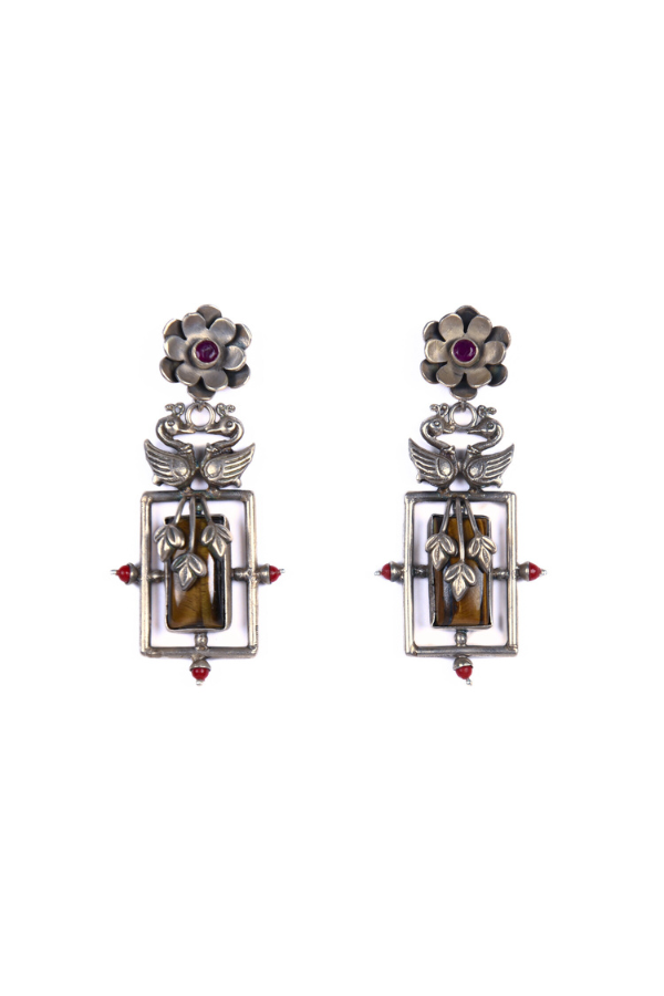 Pair of ornate earrings with tiger's eye gemstones