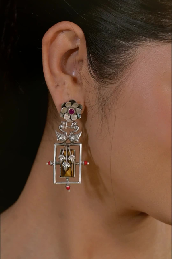 silver earring with gemstones 