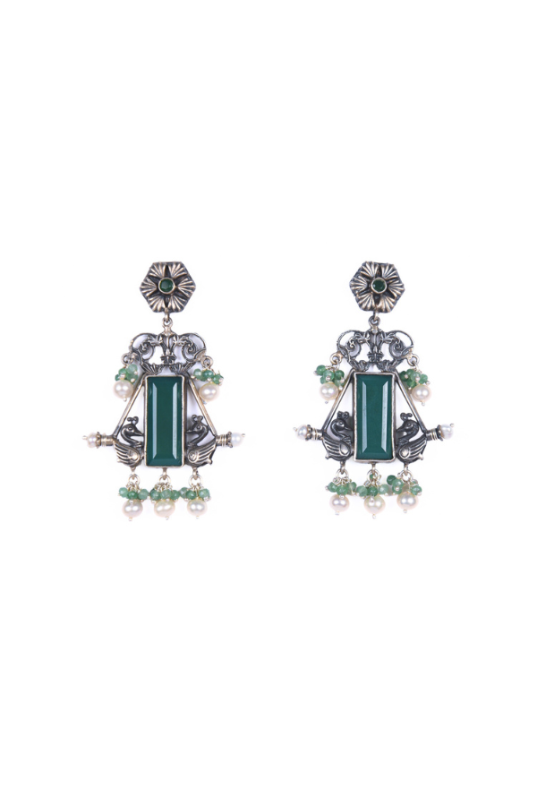 Pair of ornate earrings with green gemstones 