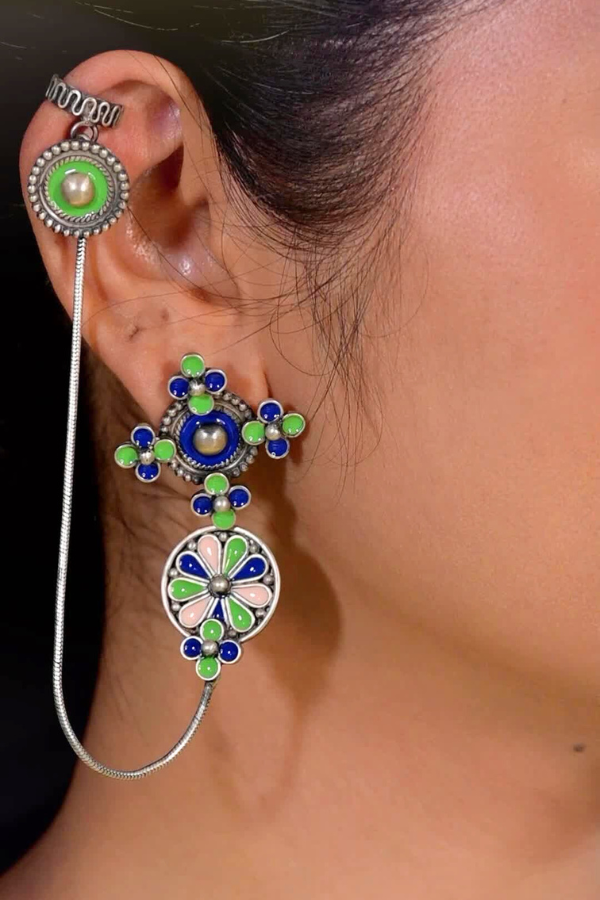 A vintage earring with decorative earrings.