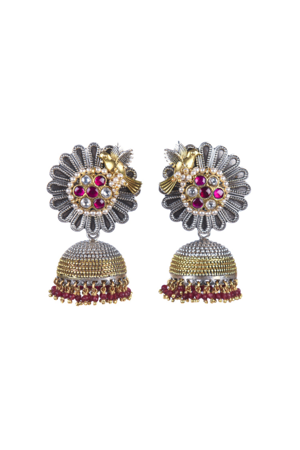 earrings with floral designs and red gemstones