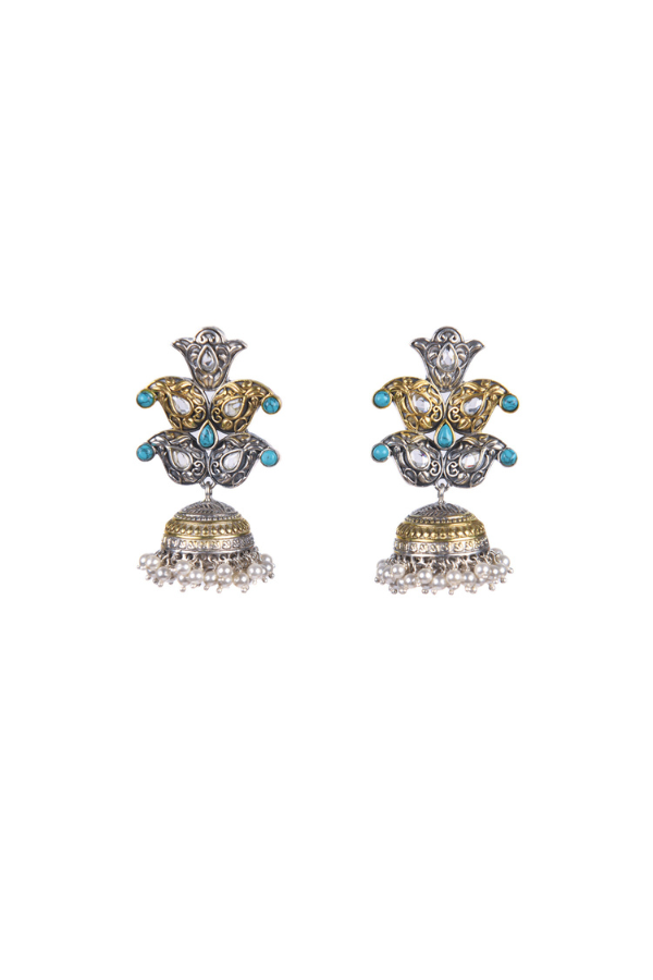 Pair of ornate earrings with turquoise stones