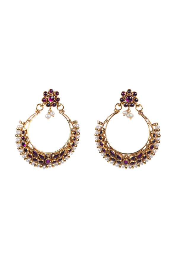 Pair of gold hoop earrings with gemstones