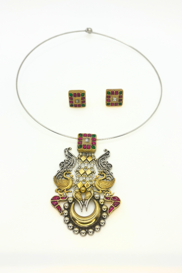 Gold necklace with pendant and matching earrings