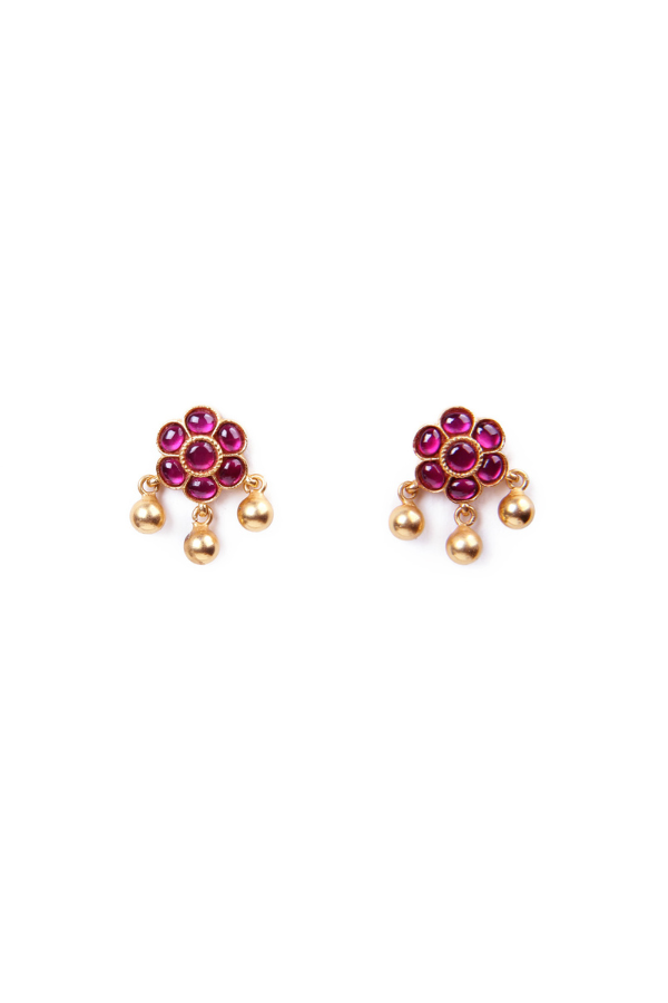 Pair of earrings with pink gemstones and gold accents 