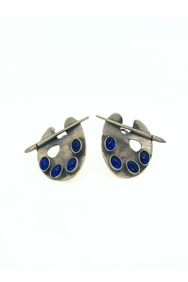 Pair of silver earrings with blue stones 