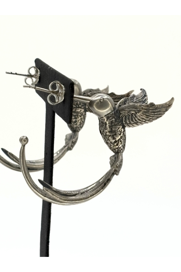Silver bird-shaped earring