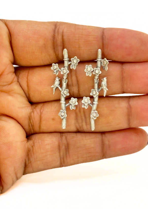Silver floral branch earrings
