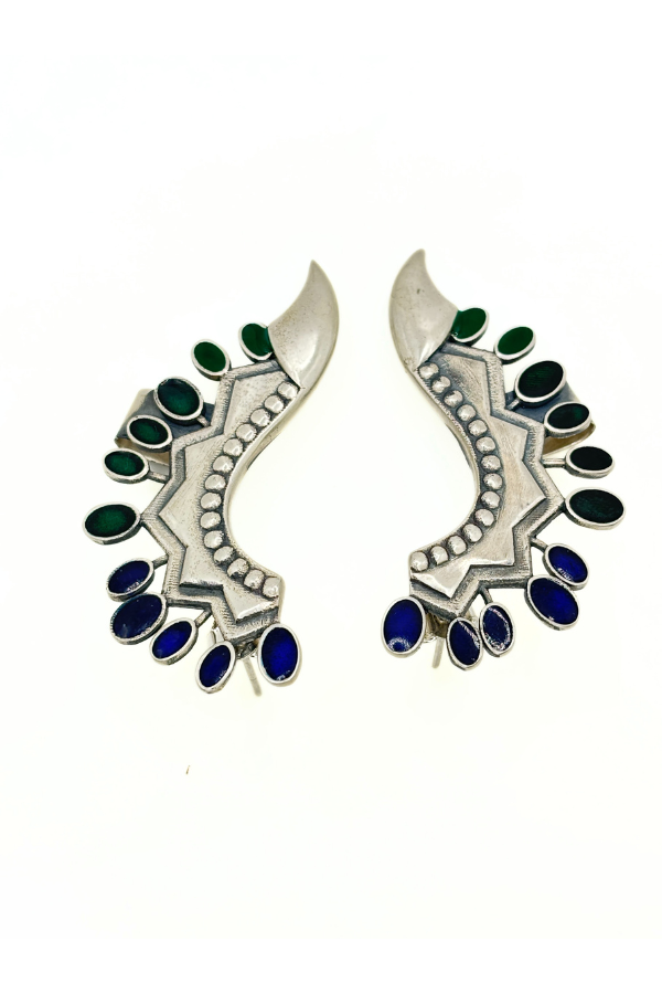 Pair of silver earrings with green and blue gemstones