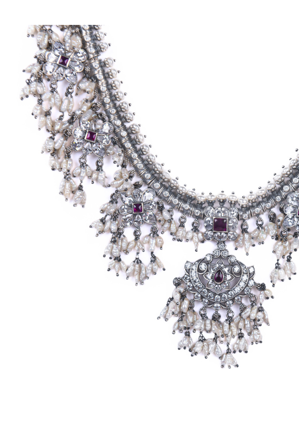 Elaborate necklace with pearls, crystals, and gemstone