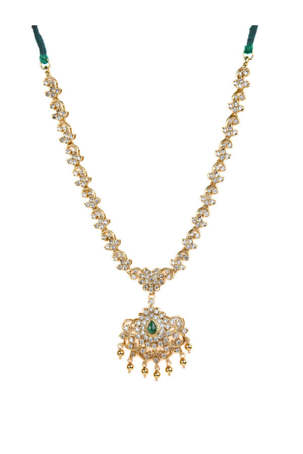 Gold necklace with green gemstones