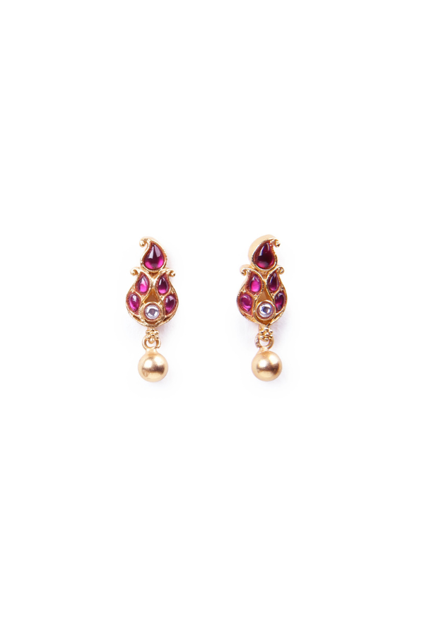 Pair of gold earrings with red gemstones