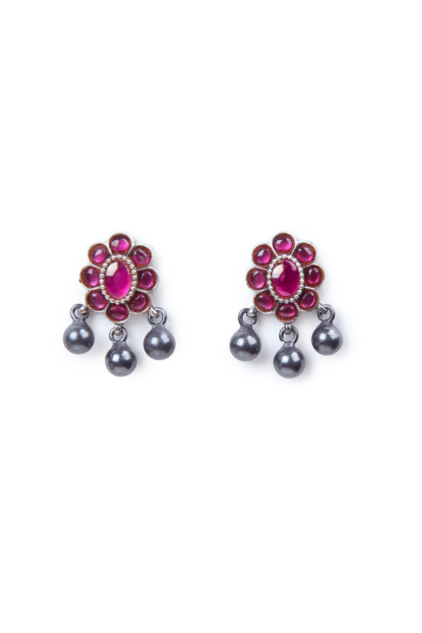 Pair of earrings with floral design and dangling 
