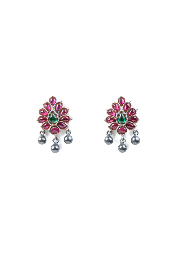 Pair of earrings with pink and green gemstones