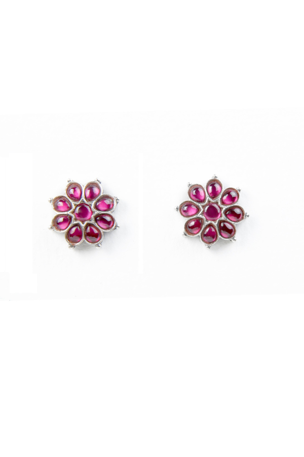Pair of flower-shaped earrings with pink gemstones 