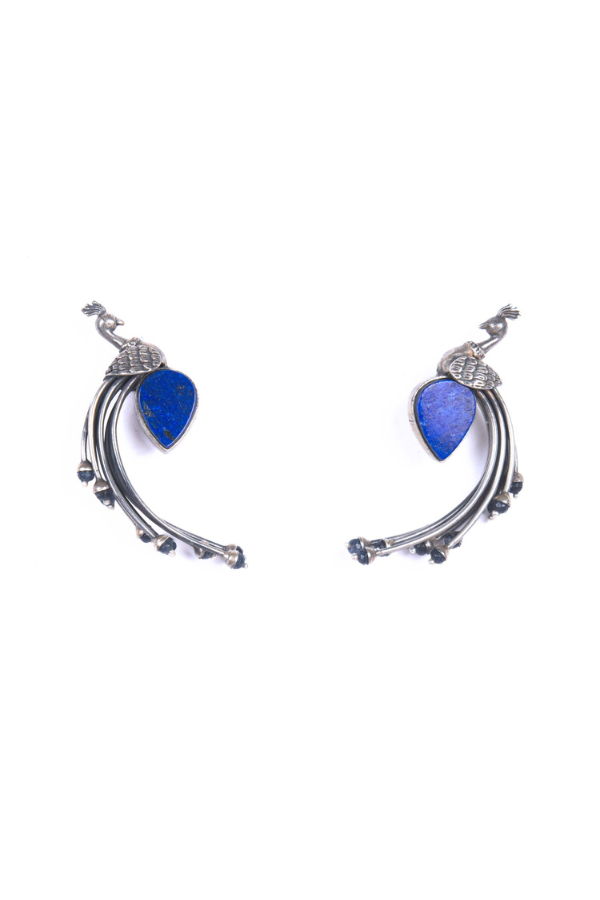 Pair of silver earrings with blue teardrop stones