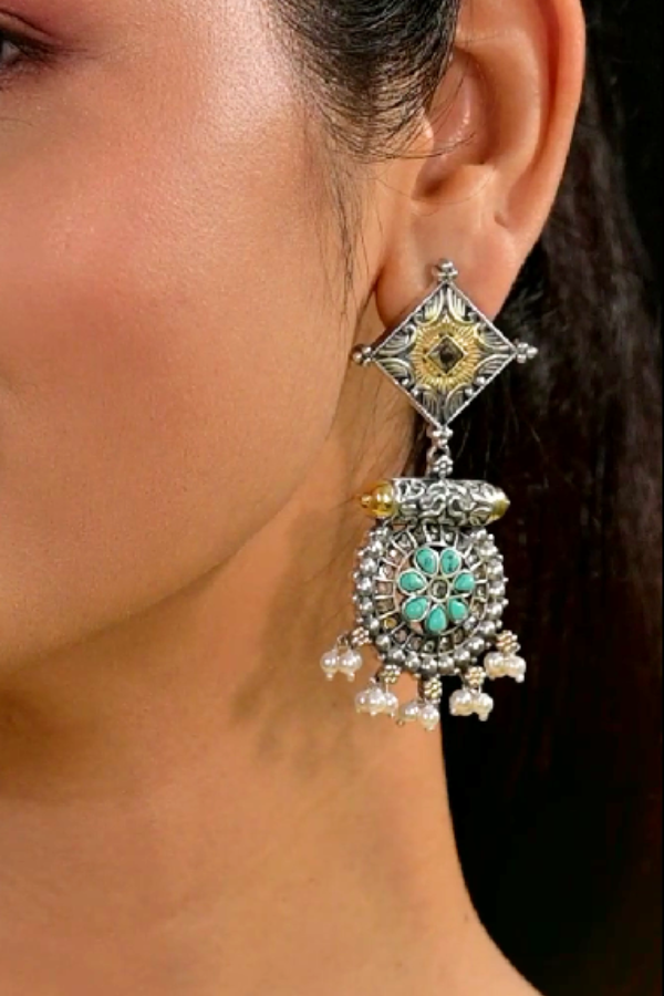 earring with turquoise stone and pearl-like elements