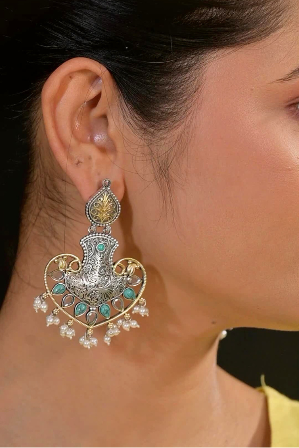 earring with intricate designs.