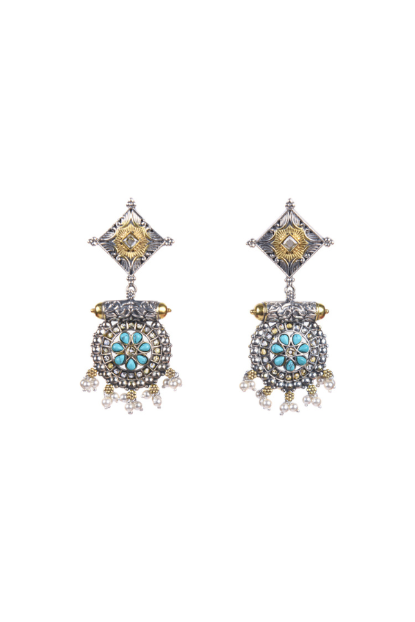 Pair of ornate earrings with turquoise stones 